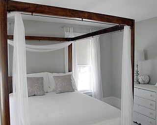        ROBERT K. YOSAY  | THE VINDICATOR.. Canopy bed.. Bella Fattoria Bed and Breakfast - on Ellsworth Road open house Feb 8th.  A 100 year old home that was recently purchased and renovated to become a B&B - Right next door is Mastropietro Winery