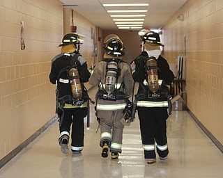        ROBERT K. YOSAY  | THE VINDICATOR....A new program at Choffin Career and Technical Center teaches students fire fighting skills and techniques while aiming to increase the number of Youngstown residents in the fire department ranks..