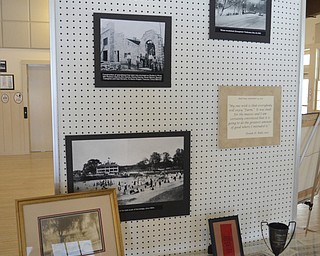 Katie Rickman | The Vindicator.Photos and newspaper clippings from past Buhl Day celebrations at Buhl Farm Park Casino on display for the centennial celebration.