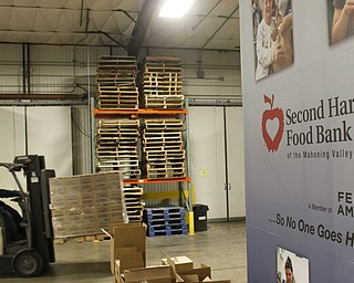        ROBERT K. YOSAY  | THE VINDICATOR..Second Harvest Food Bank of the Mahoning Valley warehouse shot to display volume of food, etc..Second Harvest Food Bank of the Mahoning Valley, 2805 Salt Springs Road, Youngstown.. Art to go with 2014 report from 2nd Harvest in which it distributed over 9 million pounds of food...