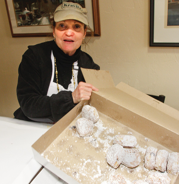 Deborah Congonello shows off paczkis, which are Polish pastries similar to doughnuts, at Kravitz Deli in the Poland library. The sweet treats, made by Kiedrowski’s Bakery in Amherst, were a popular choice for patrons at the deli, which also offered pirogies, halushki, kielbasa and more.