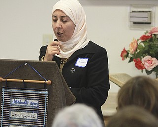 William D. Lewis The Vindicator Randa Shabayek, President , Executive Council Islamic Society of Greater Youngstown, speaks during 69th annual Interfaith Tea held Tuesday 2-3-15 at the society's mosque.