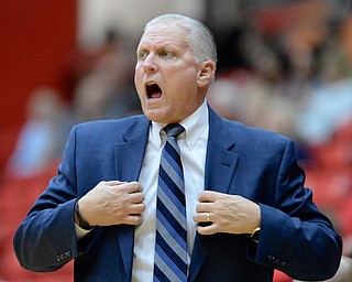 Jeff Lange | The Vindicator  Youngstown State University's men's basketball coach Jerry Slocum reacts to the performance of his team during the Penguin's loss to the Detroit Titans, Saturday, February 21 2015.