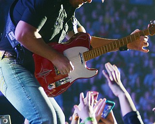 Katie Rickman | The Vindicator.Fans reach out as Brad Paisley makes his way down a walkway in the center of the stage at the Covelli Centre on Feb. 6, 2015.