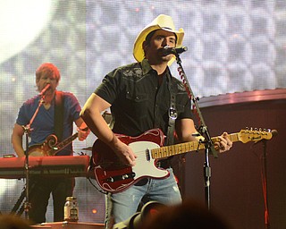 Katie Rickman | The Vindicator.Brad Paisley performs at a packed out show at The Covelli Centre on Friday, Feb. 6, 2015. Many country music fans screamed as he made his way to the stage.