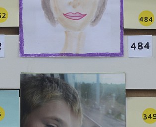 Katie Rickman | The Vindicator.Submitted artwork on display at the YMCA in Boardman on Thursday, Feb. 5, 2015. Hundreds of pieces were donated from both local artists and artists from other countries.