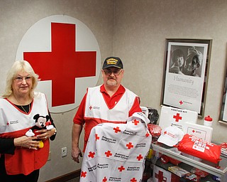       ROBERT K. YOSAY  | THE VINDICATOR..  American Red Cross of the Mahoning Valley is seeking volunteers ..Gail Hanes and Furman Alden  both from Warren and volunteers.