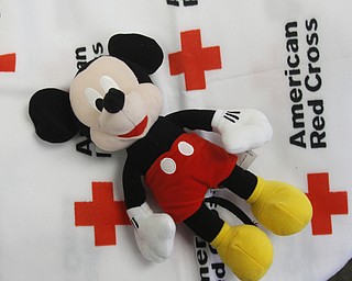        ROBERT K. YOSAY  | THE VINDICATOR.. "Mickey" and a blanket are hallmarks of the Red Cross... American Red Cross of the Mahoning Valley is seeking volunteers
