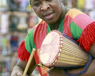 William D Lewis The Vindicator West African drummer Sogbety Diomande plays traditional drums during a Black History Month performance at the Boardman Library Monday.