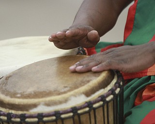 William D Lewis The Vindicator West African drummer Sogbety Diomande plays traditional drums during a Black History Month performance at the Boardman Library Monday.