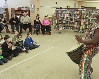 William D Lewis The Vindicator West African drummer Sogbety Diomande plays traditional drums during a Black History Month performance at the Boardman Library Monday.