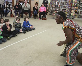 William D Lewis The Vindicator West African drummer Sogbety Diomande plays traditional drums during a Black History Month performance at the Boardman Library Monday.