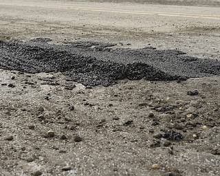        ROBERT K. YOSAY  | THE VINDICATOR..A patch job by the county road dept.. .-30-