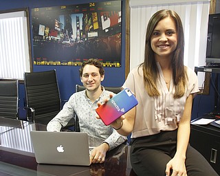        ROBERT K. YOSAY  | THE VINDICATOR..Ashley McClusky/ Nicholas Halfhill  - Spectra. Ashley and Nick who graduated from Canfield High a few years ago, are launching their mobile application for Blue Sky skilled nursing facility. The app is a secure two way connection between patients, doctors, and family. .... .-30-