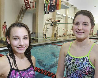 William D. Lewis the Vindicator Divers Faith Anderson, left, of East Palestine and Savannah Teter of Girard during practice at YSU.