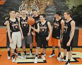 Katie Rickman | The Vindicator.Springfield seniors L-R Jordon Peterson, Tyler McLaughlin, Brandon Chamberlain, Mark Schuller, Hunter Snyder, Nate Simboli, and Neil Sofranec pose for a photo at Springfield High School on Wednesday, Feb. 11, 2015.