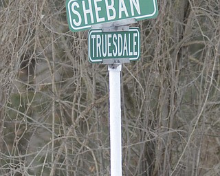 Katie Rickman | The Vindicator.Road crews work on patching pot holes on Truesdale Rd. in Youngstown on Wednesday, Feb. 11, 2015.