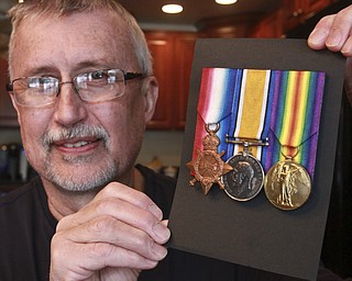 William D. Lewis the Vindicator Ed Lind of Poland with WW1 medals  from his grandfather.