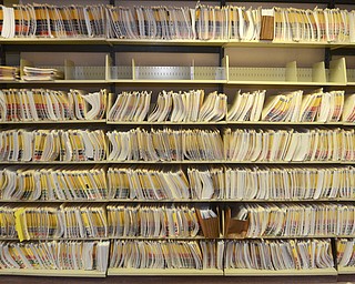 Katie Rickman | The Vindicator.The microfilm department at the Mahoning County Courthouse is in the process of sorting various documents and microfilming them on Thursday, Feb. 12, 2015. Files line the walls.