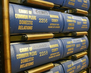 Katie Rickman | The Vindicator.The microfilm department at the Mahoning County Courthouse is in the process of sorting various documents and microfilming them on Thursday, Feb. 12, 2015. Boxes and filled with files line the basement hallway where the microfilm department is located.