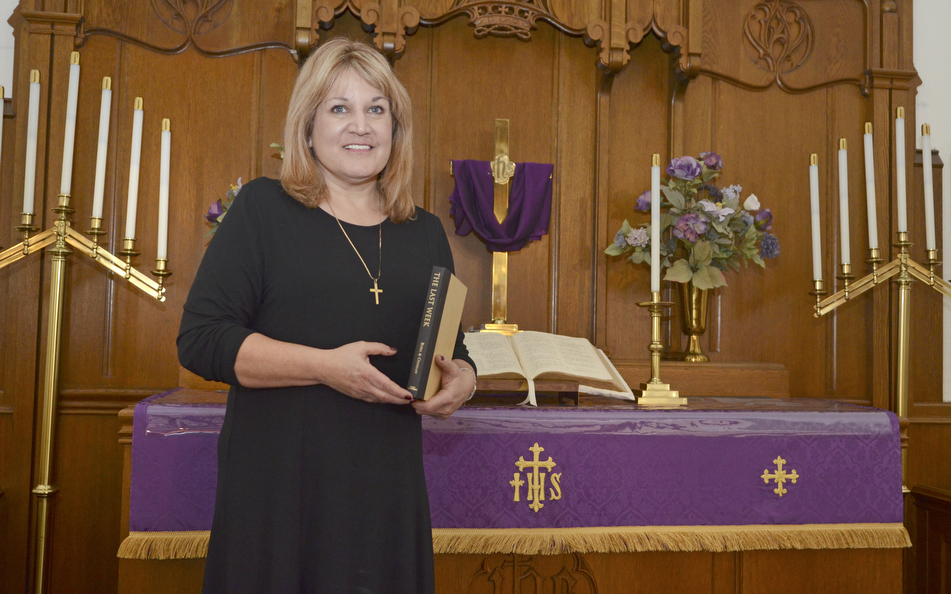 Katie Rickman | The Vindicator.Rev. Pamela Buzalka poses for a photo in the original sanctuary of Boardman United Methodist Church on Thursday, February 12, 2015. Rev. Buzalka will be teaching a series of sermons discussing the various aspects of Jesus for the Lenten season.