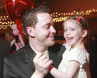 William D. Lewis the Vindicator Ash Stokes and his daughter Ivy Stokes, 6, enjoy themselves during a Daddy Daughter Valentine event at Boardman Park Thursday 2-12-15.