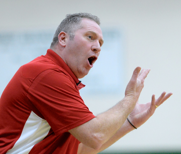 Jeff Lange | The Vindicator  Niles' head coach Doug Foster reacts to a call made by an official during his team's matchup with the West Branch Lady Warriors, Monday, February 23, 2015.