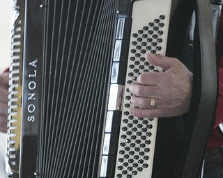        ROBERT K. YOSAY  | THE VINDICATOR..whats a polka band without an accordion as  Rich Zebrowski  plays a tune at The Paczki Polka All-Stars band performed at Kravitz Deli in Poland f