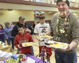 William D. Lewis The Vindicator  Jak(correct)Filisky of Hanoverton loads up on chow during a Fat Tuesday event at the Salem Community Center.