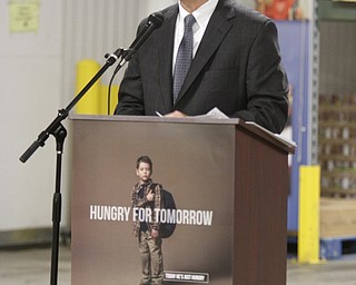        ROBERT K. YOSAY  | THE VINDICATOR..Executive Mike Iberis   kicks off the campaign thanking for all the hard work in the past.....Harvest for Hunger is a food and funds drive that takes place in March and April to help stock the Food Bank shelves for the spring and summer months when donations taper off. .