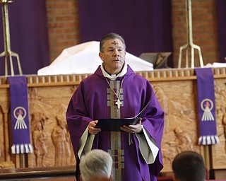        ROBERT K. YOSAY  | THE VINDICATOR..Rev Duane Jesse imparts the words of the lord at Zion Lutheran Church - on Canfield Rd - Cornersburg