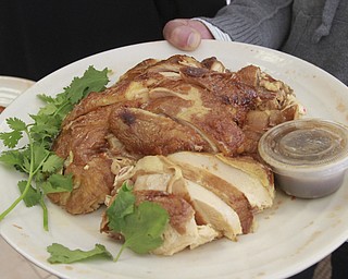 William D Lewis The Vindicator Roast Chicken is one of the dishes to be served at Chinese New Year at Girard Wok.