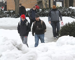        ROBERT K. YOSAY  | THE VINDICATOR..YSU   after power outtage.. all was well as students bundled up against the cold.. as classes went on