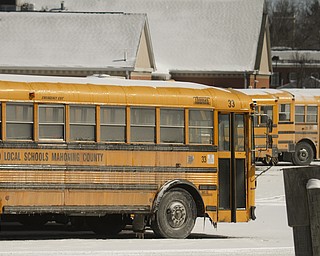        ROBERT K. YOSAY  | THE VINDICATOR..Contract talks between Canfield schools and its bus drivers are contentious over dental coverage. The Canfield school district accepted a fact-finderÕs report last week at its board of education meeting, but the Canfield School Bus Drivers Association rejected it.