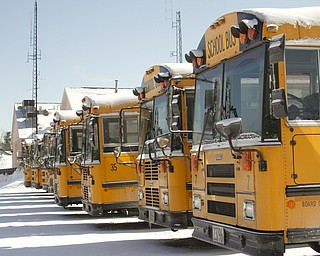        ROBERT K. YOSAY  | THE VINDICATOR..Contract talks between Canfield schools and its bus drivers are contentious over dental coverage. The Canfield school district accepted a fact-finderÕs report last week at its board of education meeting, but the Canfield School Bus Drivers Association rejected it.