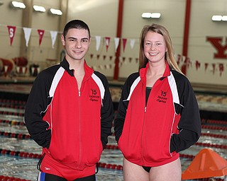 Canfield High School swim captains Kyle Anderson (left) and Sarah Heaven (right) pose for a picture during practice at the Youngstown State University Natatorium on Tuesday afternoon.  Dustin Livesay  |  The Vindicator  2/17/15  YSU.