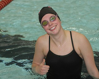 Canfield High School senior Sarah Heaven smiles after finishing a lap during practice at the Youngstown State University Natatorium on Tuesday afternoon.  Dustin Livesay  |  The Vindicator  2/17/15  YSU.