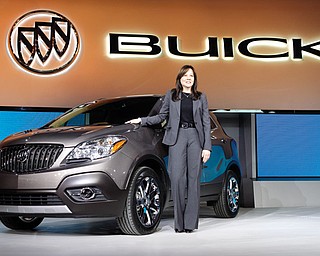 Mary Barra, then General Motors senior vice president, Global Product Development, introduces the 2013 Buick Encore at the North American International Auto Show in Detroit. Buick has made a comeback by appealing to younger buyers.