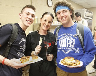        ROBERT K. YOSAY  | THE VINDICATOR..Mike Yourstowsky and Dylan Kuhn both seniors with Barb Cummings --..Canfield High School lunch time is  more the PBJ  - as  Panini's Salad home made soup ... etc  claims to be one of the best lunchrooms in the county ...