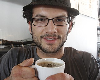        ROBERT K. YOSAY  | THE VINDICATOR..Pedro Sanchez -  and a cup of joe..Pressed Coffee Bar & Eatery recently opened On Lincoln Ave  across fromf Cushwa Hall....