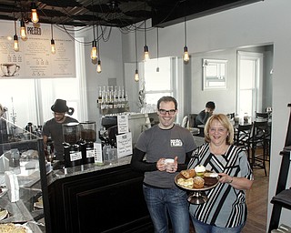        ROBERT K. YOSAY  | THE VINDICATOR..Pam Von Bergen and Frank Tuscano.. .Pressed Coffee Bar & Eatery recently opened On Lincoln Ave  across fromf Cushwa Hall....
