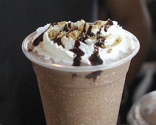        ROBERT K. YOSAY  | THE VINDICATOR..Flavourful iced coffee with whipped cream chocolate and spice..Pressed Coffee Bar & Eatery recently opened On Lincoln Ave  across fromf Cushwa Hall....