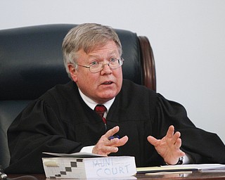        ROBERT K. YOSAY  | THE VINDICATOR.. John Dellick received 18 months of probation today and also must perform 160 hours of community service..Dellick was sentenced after pleading guilty Dec. 8 to aggravated assault and a misdemeanor assault charge. with him is Lawyer Samuel Amendolara- judge Michael Nunner .