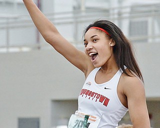 Jeff Lange | The Vindicator  YSU's Taylor McDonald celebrates after receiving the Freshman of theYear Award after Sunday's indoor track meet in Youngstown.