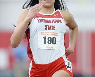 Jeff Lange | The Vindicator  YSU's Nina Grambling makes her way down the homestretch of the 200 meter dash, Sunday afternoon during the Horizon League indoor track championship in Youngstown.
