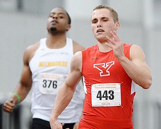 Jeff Lange | The Vindicator  YSU's Carl Zallow (443) sprints to the finish past Milwaukee's Davontae Johnson during the men's 200 meter dash, Sunday afternoon at YSU.