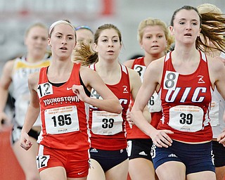 Jeff Lange | The Vindicator  YSU's McKinsie Klim (195) runs with a large group of girls during the women's 3,000 meter run, Sunday afternoon in Youngstown. Klim finished 7th with a time of 10:14.02.