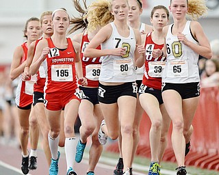 Jeff Lange | The Vindicator  YSU's McKinsie Klim (195) runs with a large group of girls during the women's 3,000 meter run, Sunday afternoon in Youngstown. Klim finished 7th with a time of 10:14.02.