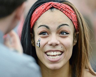 Jeff Lange | The Vindicator  Youngstown's Nina Grambling smiles as she speaks with sports writer Joe Scalzo after Sunday's Horizon League indoor track Championships.