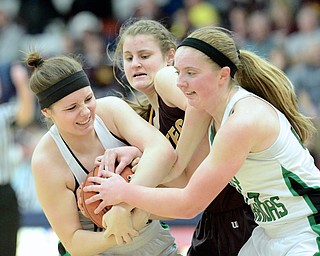 Jeff Lange | The Vindicator  West Branch's Paige Walsh (left) and Lea Bock (right) fight for possession of the ball with Southeast's Danielle Norquest in the second quarter of their sectioinal semi-final matchup in Austintown, Monday evening.